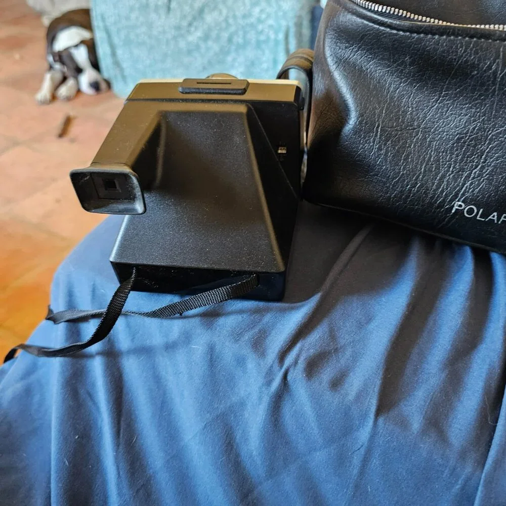 Vintage polaroid one step rainbow camera